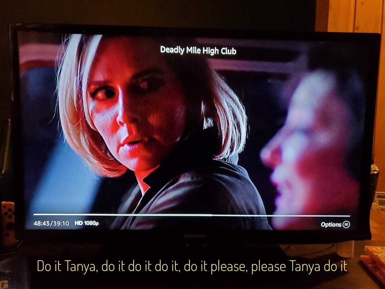 An appalled Tanya swiveling to look at Margaret, captioned "Do it Tanya, do it do it do it, do it please, please Tanya do it"
