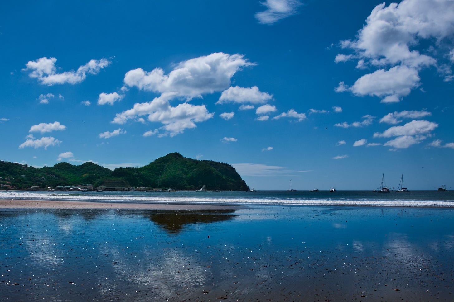 Nicaraguan waterfront with boats and a peninsula
