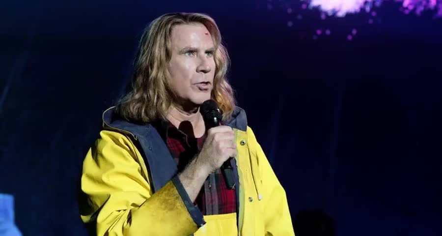 Eurovision Song Contest The Story of Fire Saga still of Will Ferrell with a microphone on stage.