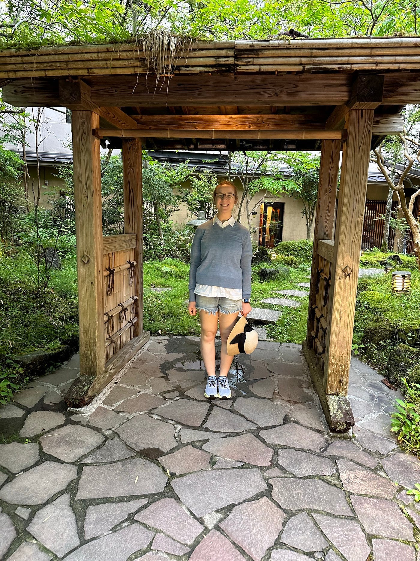 Mari-Alina Timoshchuk in front of the Japanese traditional inn