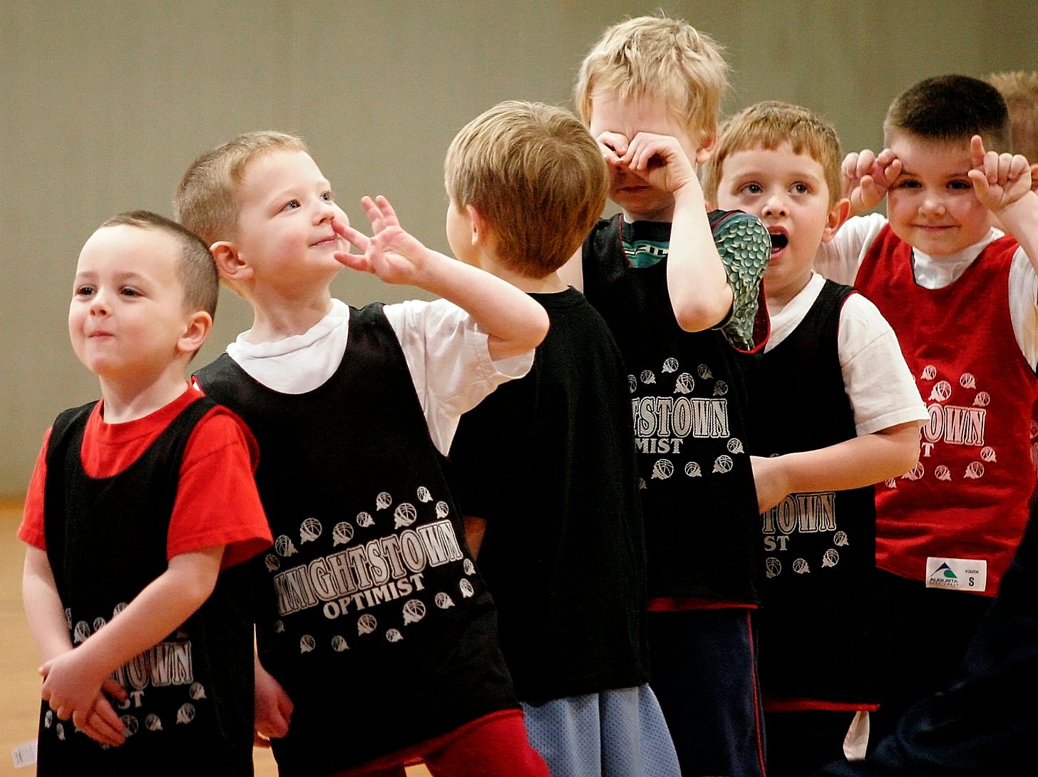 Put 10 little boys in a line and make them wait to shoot free throws. Then, sit at a distance with a telephoto lens and watch the hilarity as they bide their time waiting their turns. Ten different kids equates to 10 different ways of doing that.