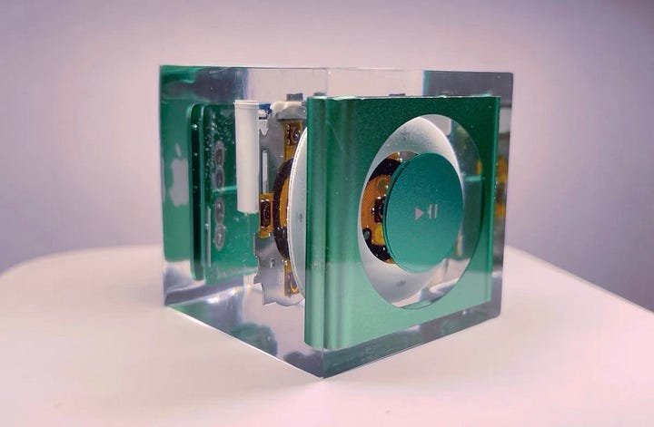 Design in Resin: A rare glimpse into Apple's prototype stages. The iPod shuffle's control pad suspended in time.