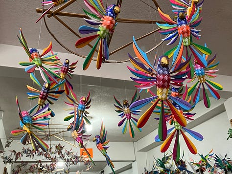 Wood carving and painting the colorful Alebrijes