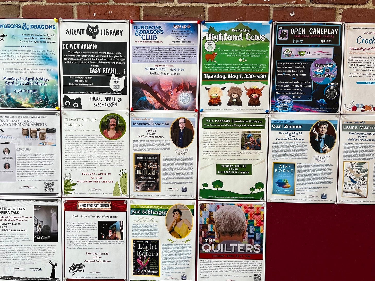 many fliers hung on a bulletin board