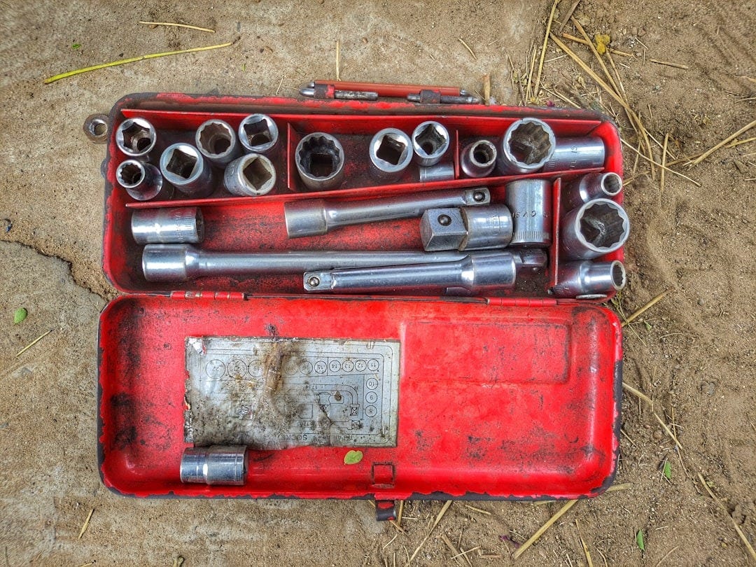 a red box with a couple of guns in it a red box with a couple of guns in it