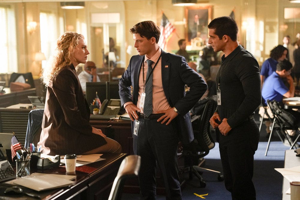 LINE OF FIRE -- "Cabin Pressure" Episode 106 -- Pictured: (l-r) Clare, Russ, and Brandon in the office planning to save Jane LINE OF FIRE -- "Cabin Pressure" Episode 106 -- Pictured: (l-r) Clare, Russ, and Brandon in the office planning to save Jane