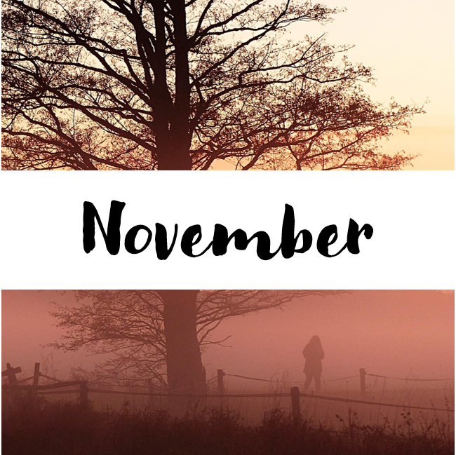 The silhouette of a tree against a misty sky. In a white banner, the text reads "November"