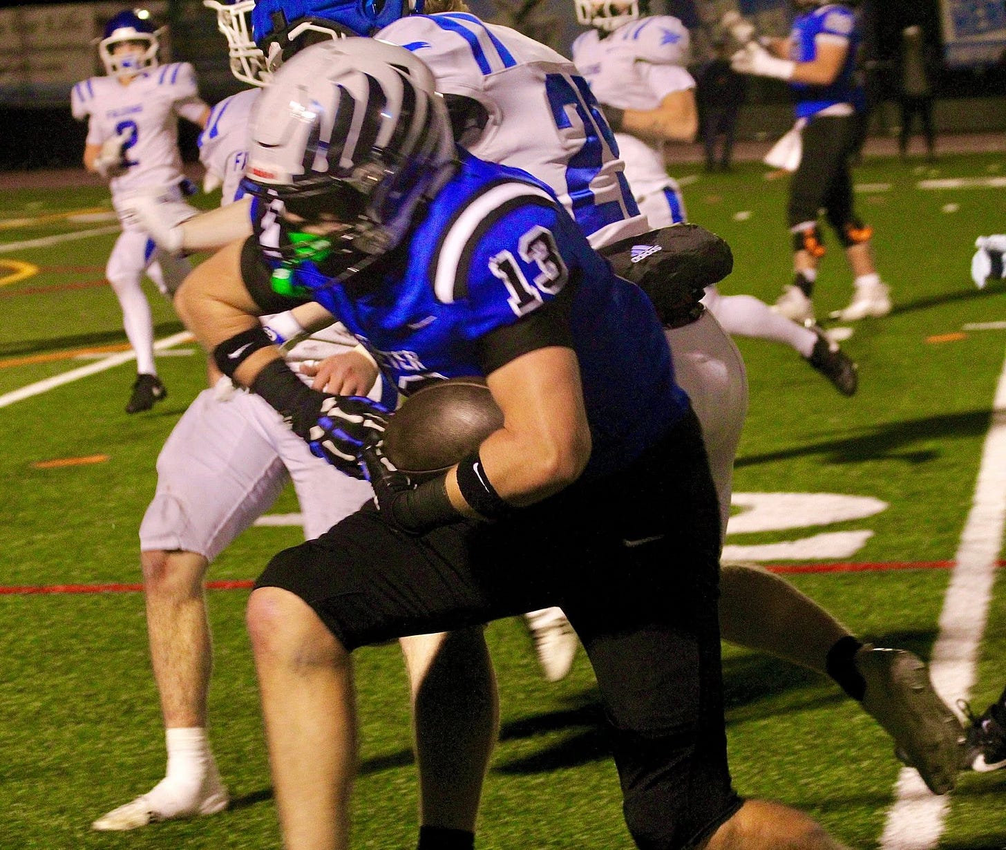 May be an image of football and text