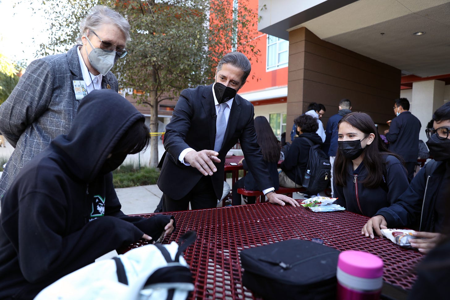 MAYWOOD, CA - FEBRUARY 16: Superintendent Alberto M. Carvalho, center, Los Angeles Unifed School District, meets with students at lunch break as he tours Maywood Center For Enriched Studies (MaCES) Magnet school on Wednesday, Feb. 16, 2022 in Maywood, CA. Superintendent Carvalho conducted a two-day school tour, visiting special programs and classrooms at sites across the District. Jackie Goldberg, left, LAUSD school board member representing District 5 of the Los Angeles Unified School District is shown in the photo. (Gary Coronado / Los Angeles Times via Getty Images) MAYWOOD, CA - FEBRUARY 16: Superintendent Alberto M. Carvalho, center, Los Angeles Unifed School District, meets with students at lunch break as he tours Maywood Center For Enriched Studies (MaCES) Magnet school on Wednesday, Feb. 16, 2022 in Maywood, CA. Superintendent Carvalho conducted a two-day school tour, visiting special programs and classrooms at sites across the District. Jackie Goldberg, left, LAUSD school board member representing District 5 of the Los Angeles Unified School District is shown in the photo. (Gary Coronado / Los Angeles Times via Getty Images)