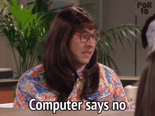 a woman says computer says no in front of a palm tree a woman says computer says no in front of a palm tree