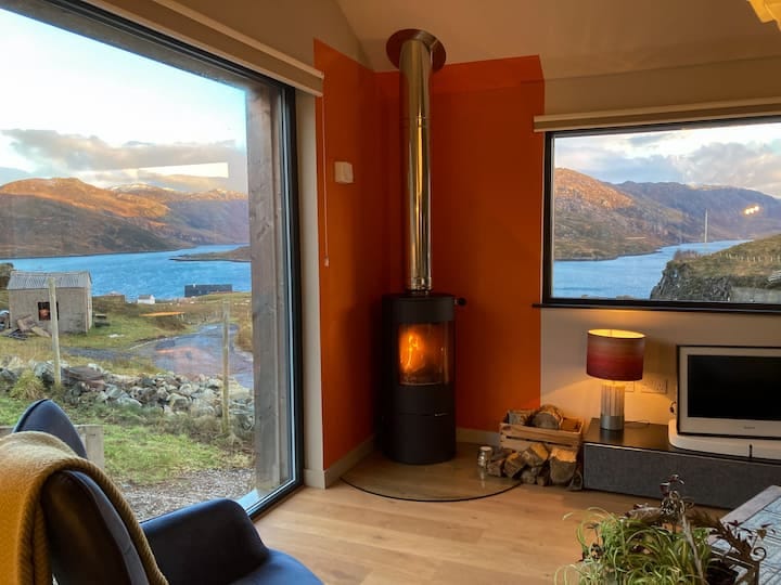 The lounge overlooking the sea-lochs Glencoul and Glendhu