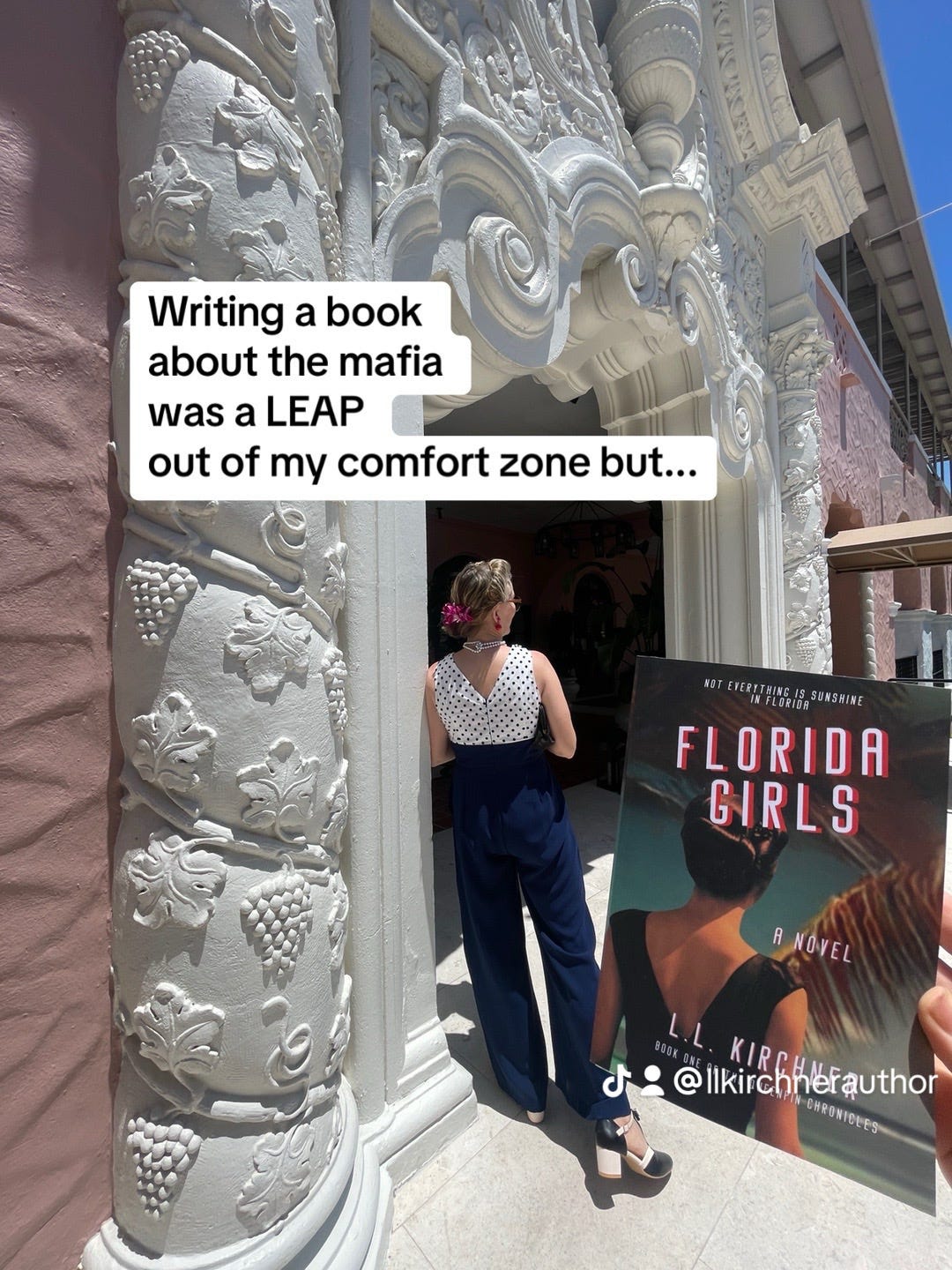 The author dressed in 1940s style costume, standing by Saint Petersburg Don Cesar hotel