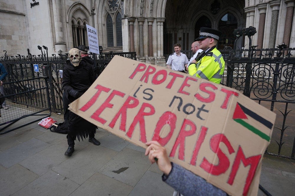 Supporters of Palestine Action stage a protest outside the Royal Court of Justice in London, April 28, 2026 (AP) Supporters of Palestine Action stage a protest outside the Royal Court of Justice in London, April 28, 2026 (AP)
