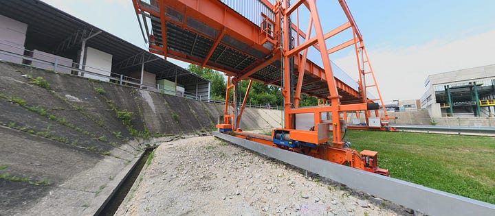 Side-by-side comparison of the real crane structure and its black-and-white 3D point cloud
