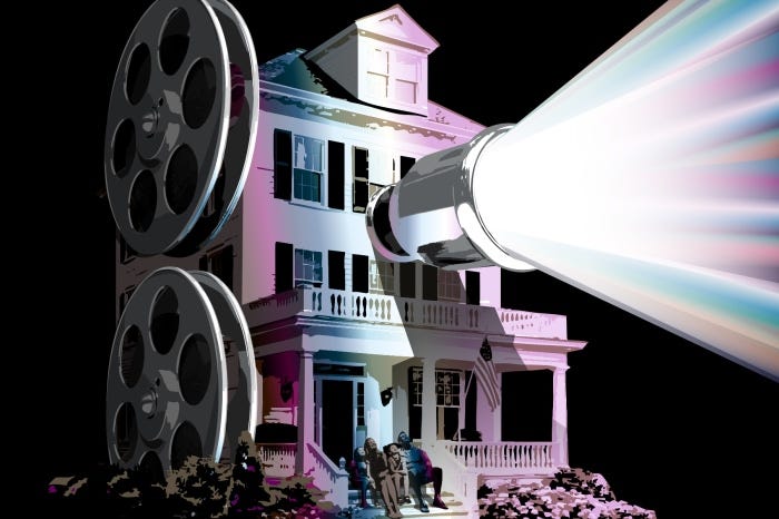 Illustration of a film projector shining a rainbow beam onto a house where a family sits on the steps, with film reels beside the house.