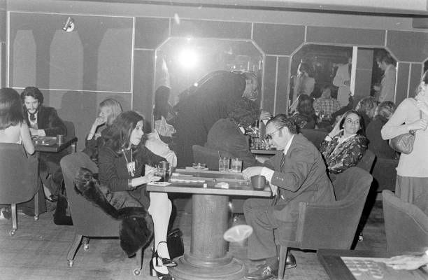 Guests attend the opening of the private club PIPS in Beverly Hills, California, on February 16, 1973.