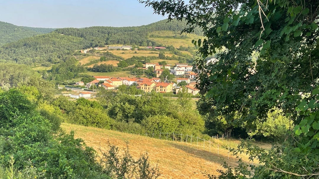 Landscape view with a small village in the distance.