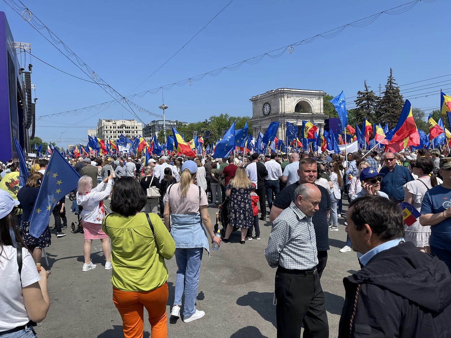 May be an image of 2 people, crowd and text