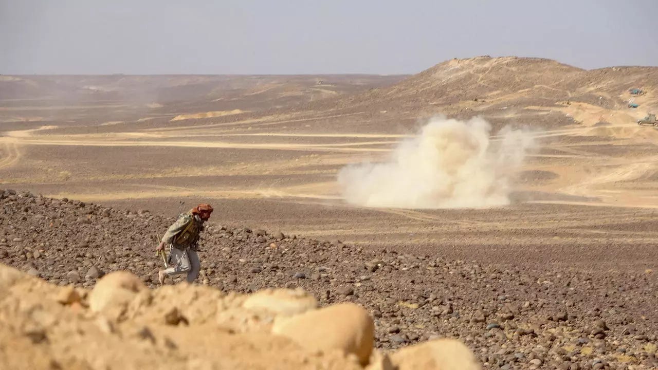 Smoke billows during clashes between forces loyal to Yemen's Saudi-backed government and Houthi rebel fighters in al-Jadaan area 50 kilometres northwest of Marib in central Yemen on February 11, 2021. Smoke billows during clashes between forces loyal to Yemen's Saudi-backed government and Houthi rebel fighters in al-Jadaan area 50 kilometres northwest of Marib in central Yemen on February 11, 2021.