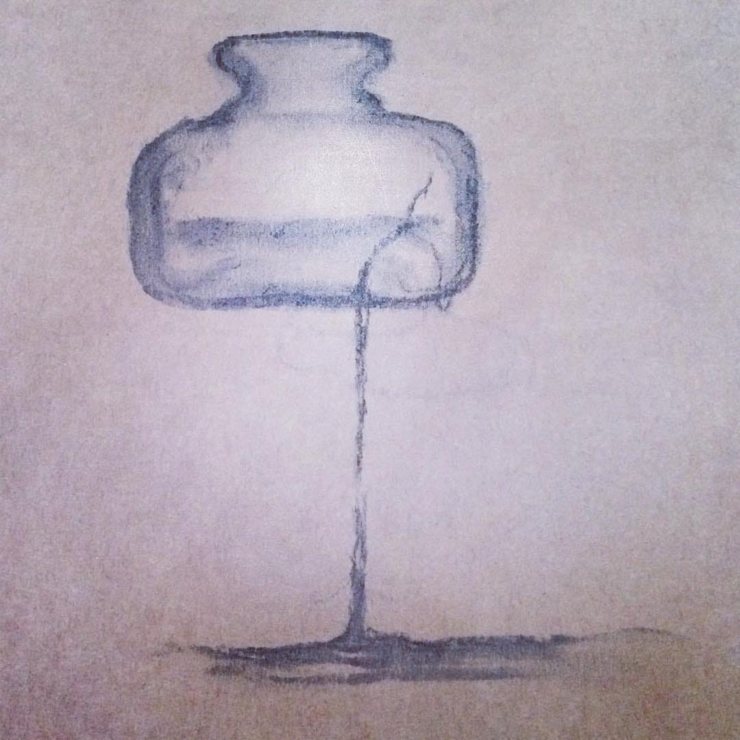 A broken bottle and spilled perfume