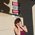 "My Life is Dangerous" Signage Photo Series
