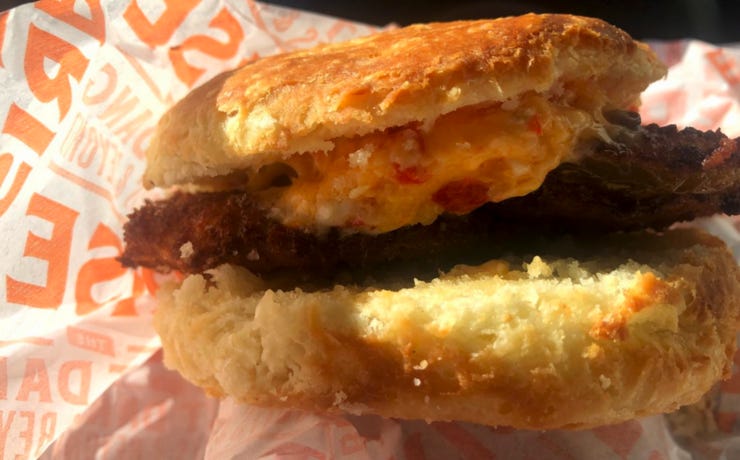 image of a fried green tomato and pimento cheese biscuit