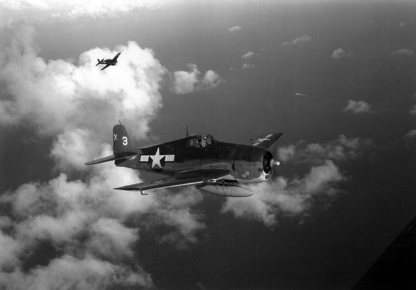 USN Grumman F6F-3 Hellcats from the Light Carrier USS San Jacinto flying over the Pacific, 1944. USN Grumman F6F-3 Hellcats from the Light Carrier USS San Jacinto flying over the Pacific, 1944.