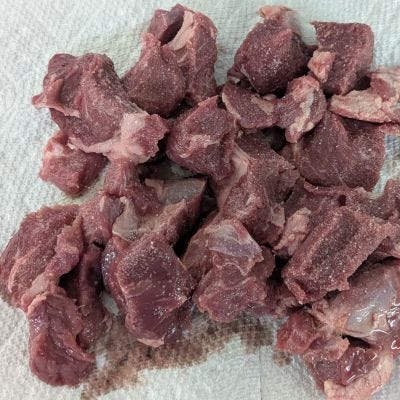 Pictures of meat and whole and sliced potatoes