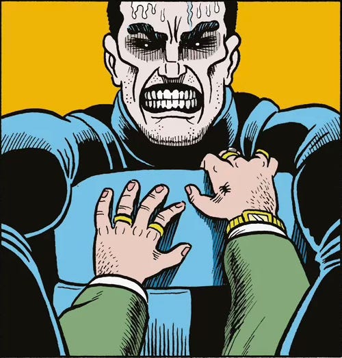 A close up of Annihilator, with hate in his eyes, in the action of likely choking a man to death. We can't see his hands or the neck or head of the man, but his hands, each with two rings, reminiscent of a trashy mafia dude, are grasping at the chest plate, in near worthless response. A close up of Annihilator, with hate in his eyes, in the action of likely choking a man to death. We can't see his hands or the neck or head of the man, but his hands, each with two rings, reminiscent of a trashy mafia dude, are grasping at the chest plate, in near worthless response.