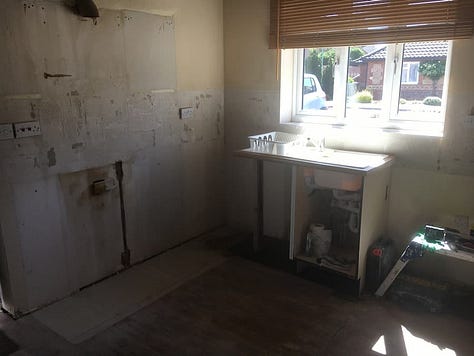 Bare kitchen after all the units have been removed