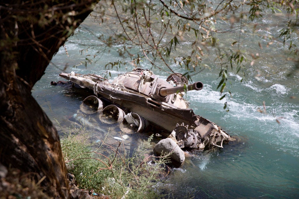 Soviet tank abandoned in a Panjshir valley. 