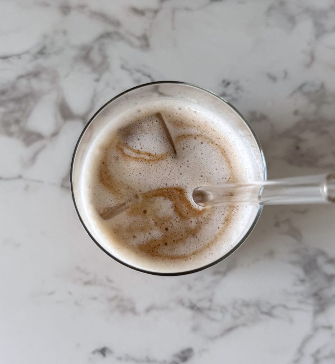 High-protein iced coffee with a shot of espresso, frothy almond milk, and a cozy speculoos flavor perfect for winter. High-protein iced coffee with a shot of espresso, frothy almond milk, and a cozy speculoos flavor perfect for winter.