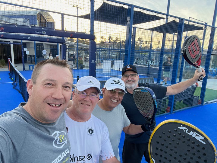 Group of players socializing at P1 Padel in Las Vegas