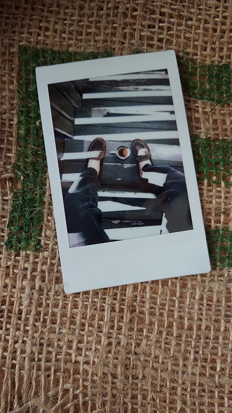 A collage of instant photographs of coffee mugs or a bald, bearded, white man drinking coffee.