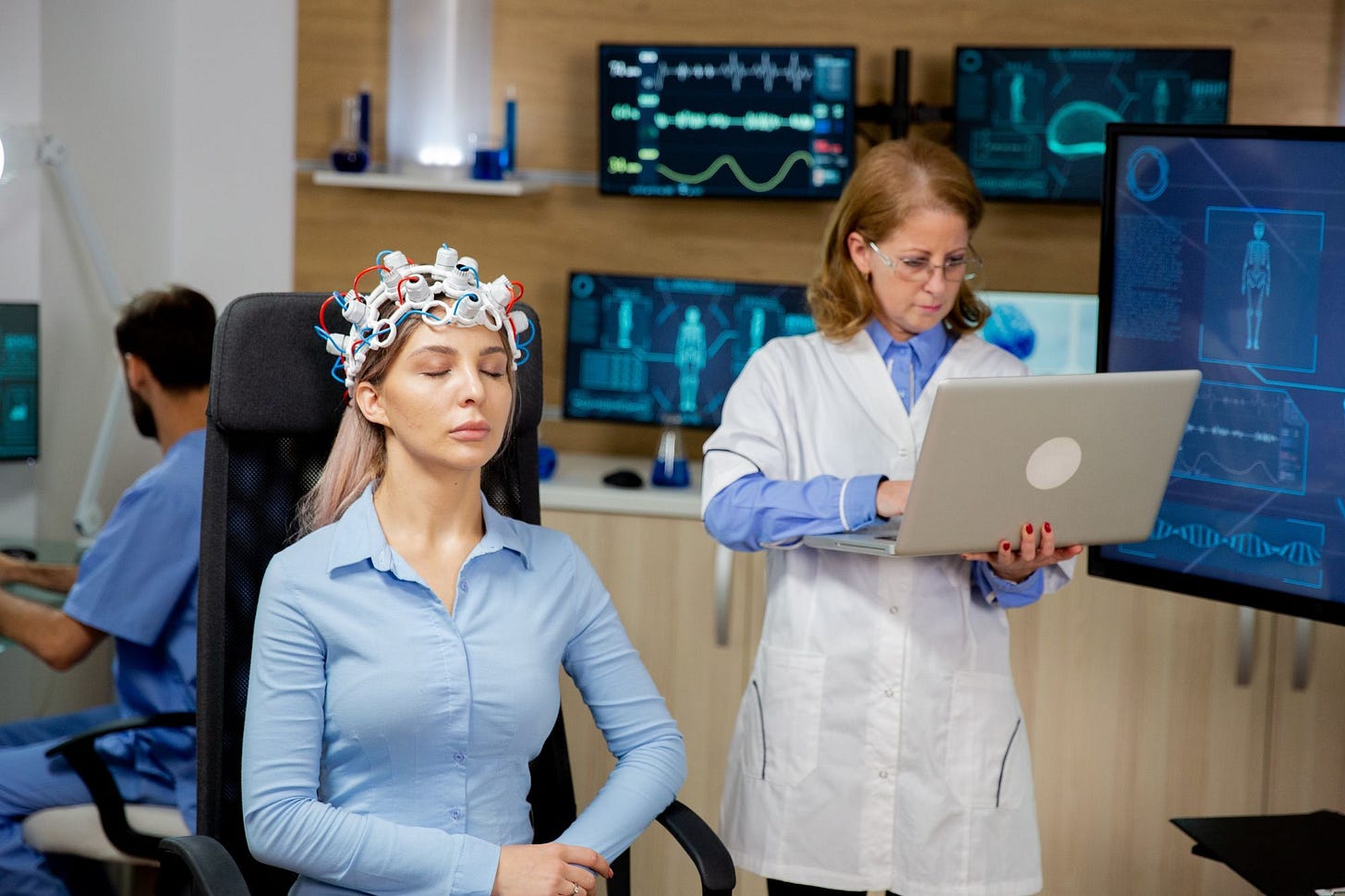 A lady having electrodes on her head being sleep researched