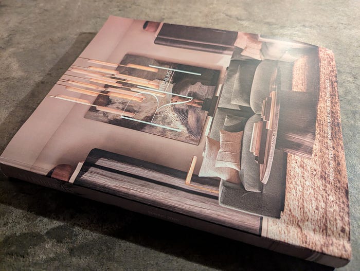 A catalog lying on a coffee table.