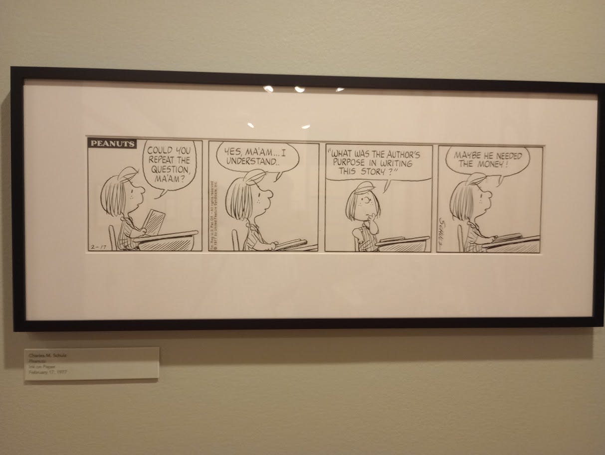 Peppermint Patty at desk in classroom
