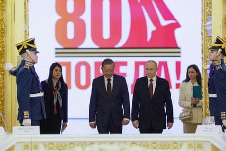 Russia's president Vladimir Putin (C-R) and the general secretary of the Communist party of Vietnam To Lam (C-L) arrive for a meeting with members of their delegations in Moscow on Saturday.