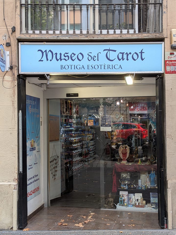 The sign, shop front and interior shots of the hundreds of decks on display in the Museo de Tarot