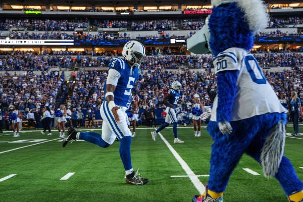 Quarterback Anthony Richardson of the Indianapolis Colts takes the field prior to an NFL football game against the Denver Broncos at Lucas Oil...
