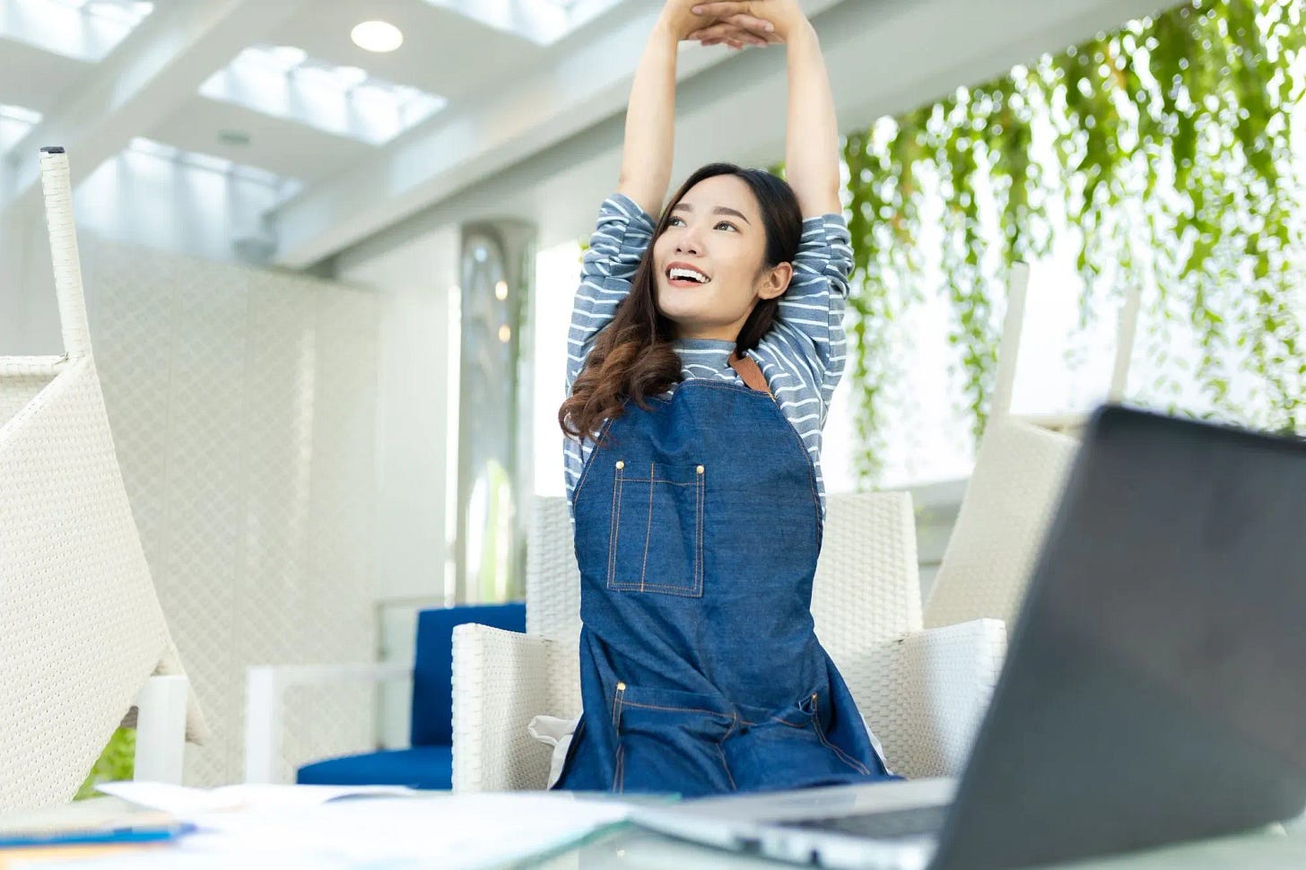 Energetic woman taking a short movement break from work