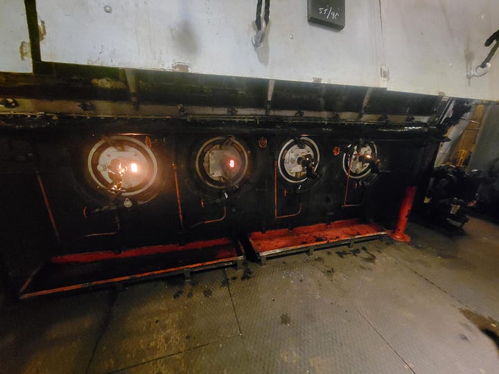 The fireboxes, one of the window ports, the boiler tube ends and a diagram of the engine itself