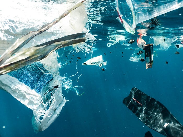 A collection of plastic trash in the ocean. A collection of plastic trash in the ocean.