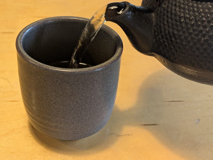 A bowl of panang curry and some tea I had at Thai Pantry last week.