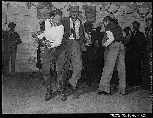 Black and white image of two people dancing. Black and white image of two people dancing.