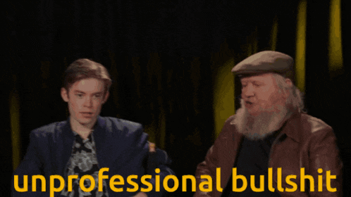 a man with a beard sits next to a younger man with the words " unprofessional bullshit " written in yellow a man with a beard sits next to a younger man with the words " unprofessional bullshit " written in yellow