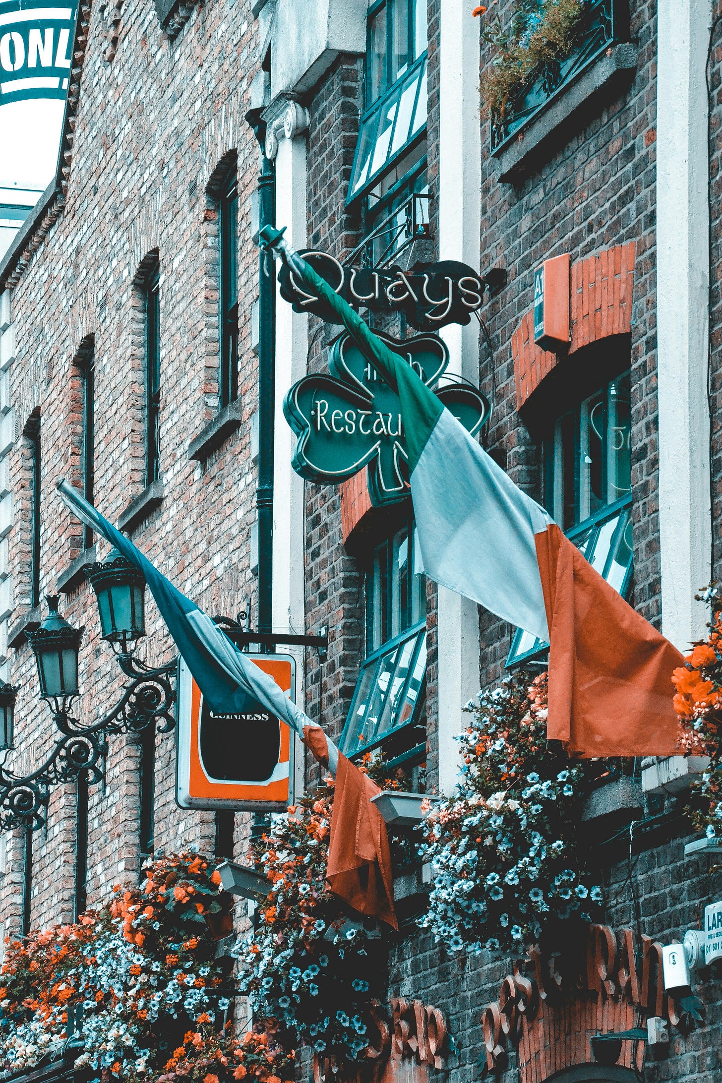 Orange and green flags outside an Irish restaurant