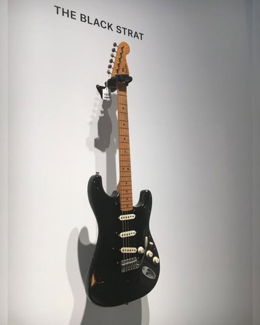 May be an image of guitar and text May be an image of guitar and text