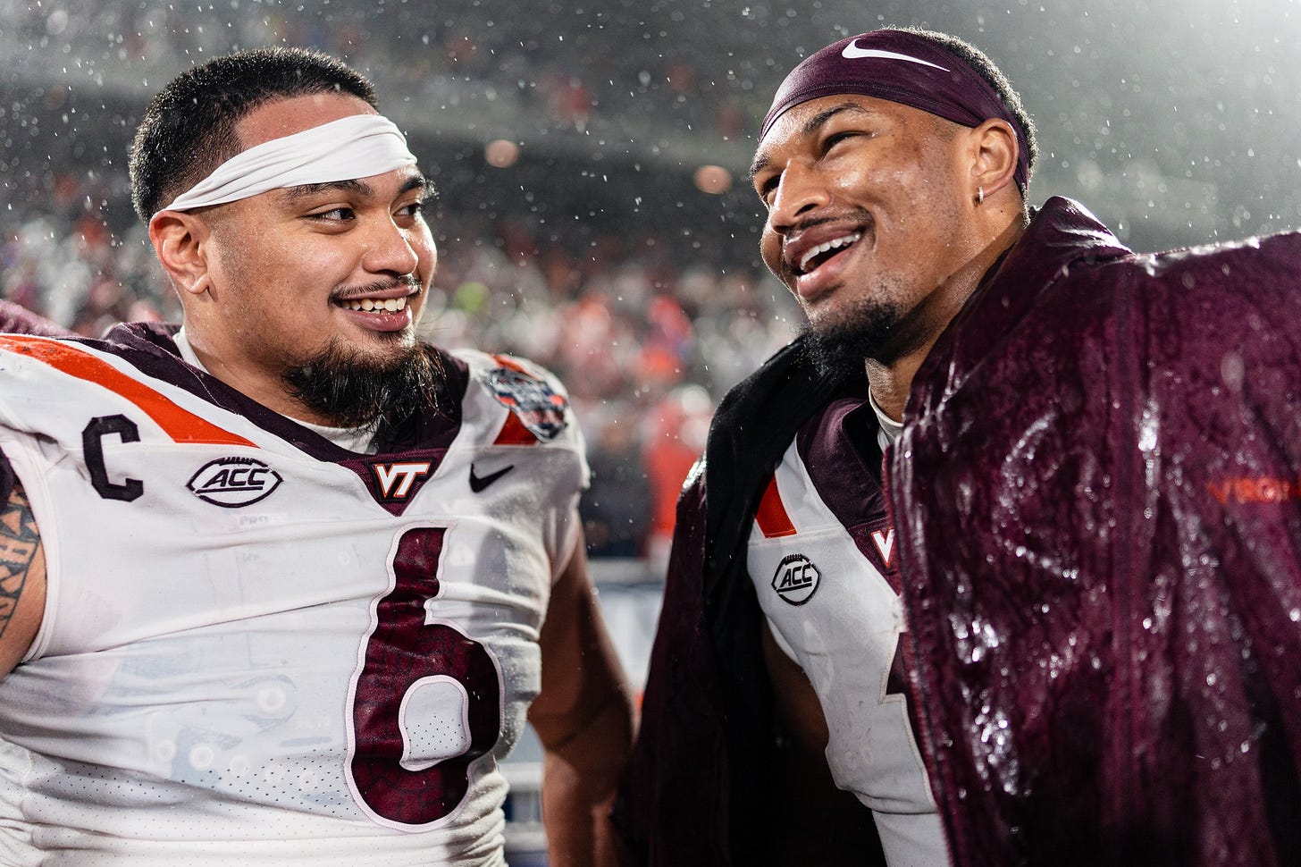 Virginia Tech's Josh Fuga and Kyron Drones embrace one another at the 2023 Military Bowl. Virginia Tech's Josh Fuga and Kyron Drones embrace one another at the 2023 Military Bowl.