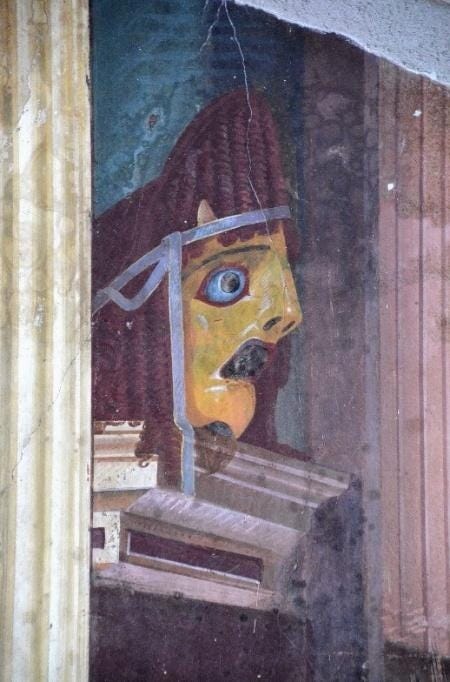 The tragic mask in the Villa Poppaea, Oplontis, 1st century AD. The tragic mask in the Villa Poppaea, Oplontis, 1st century AD.